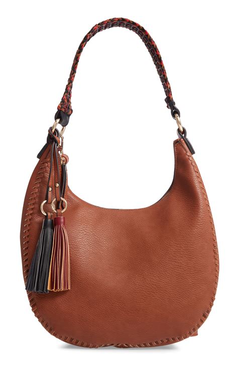 WOMEN'S LUXURY LEATHER HOBO AND TOTE BAGS .